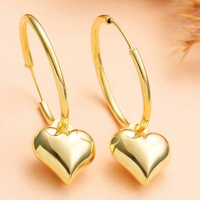 Gümüş Gold Kalp Sallantılı Kadın Küpe görsel 1