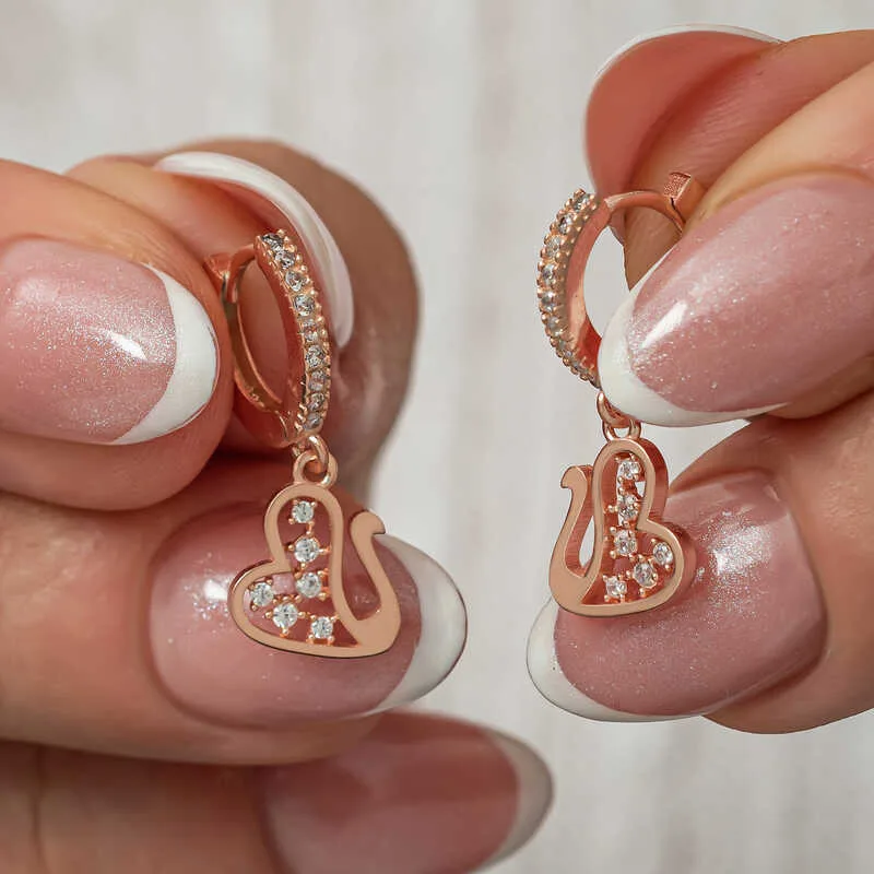 Gümüş Sallantılı Rose Kuğu Kadın Küpe görsel 1
